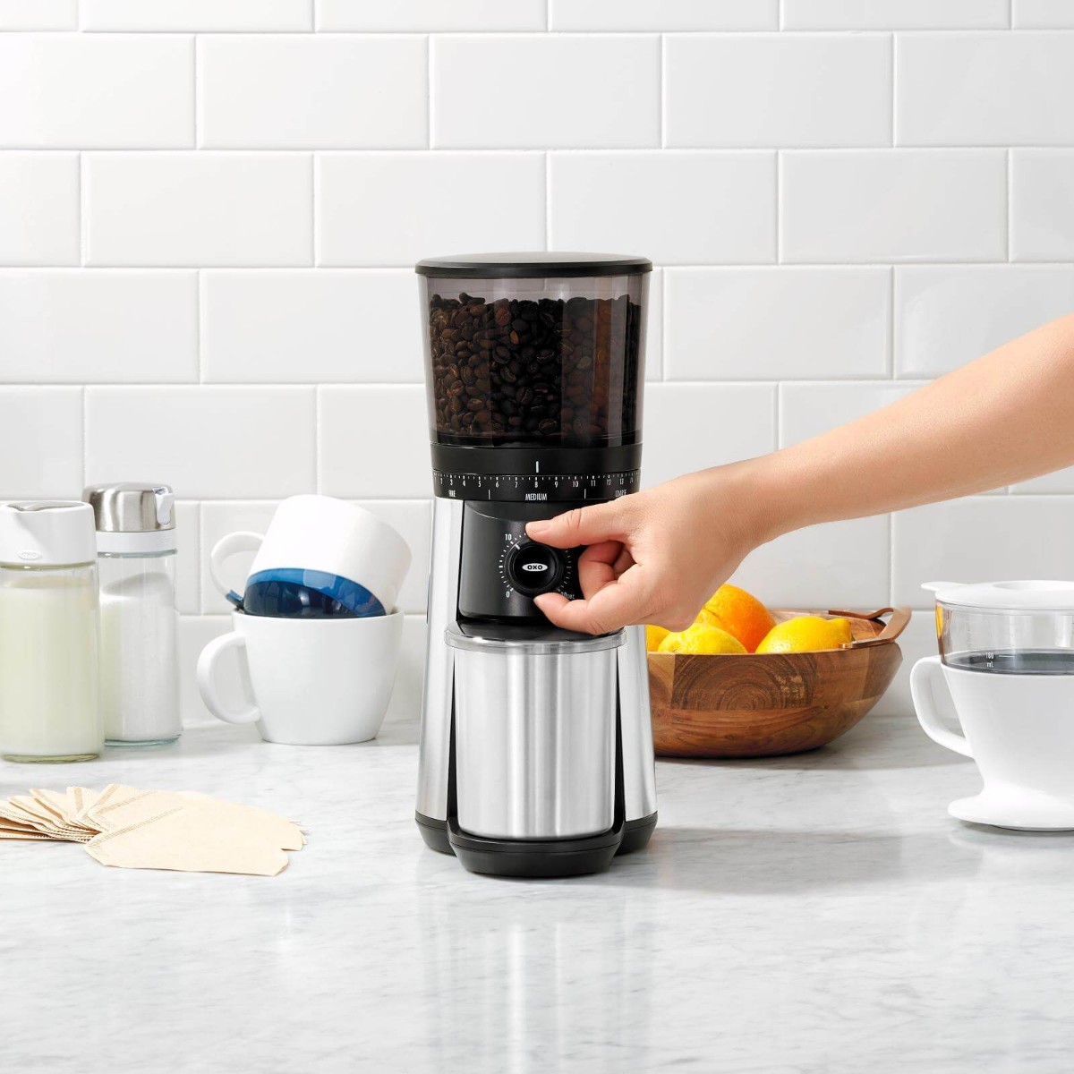 OXO Brew Conical Burr Coffee Grinder on a kitchen counter